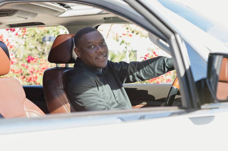 Secure Taxi driver ready to welcome guests